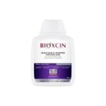 شامپو گیاهی ضد ریزش مو حاوی سیر سیاه بیوکسین BIOXCIN(300 میل)